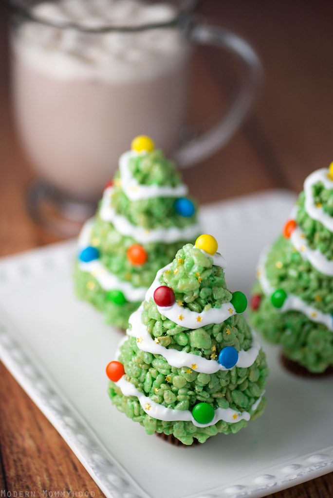 Krispie Treat Christmas Trees - a very easy holiday dessert! Perfect for school parties and family holiday get togethers!