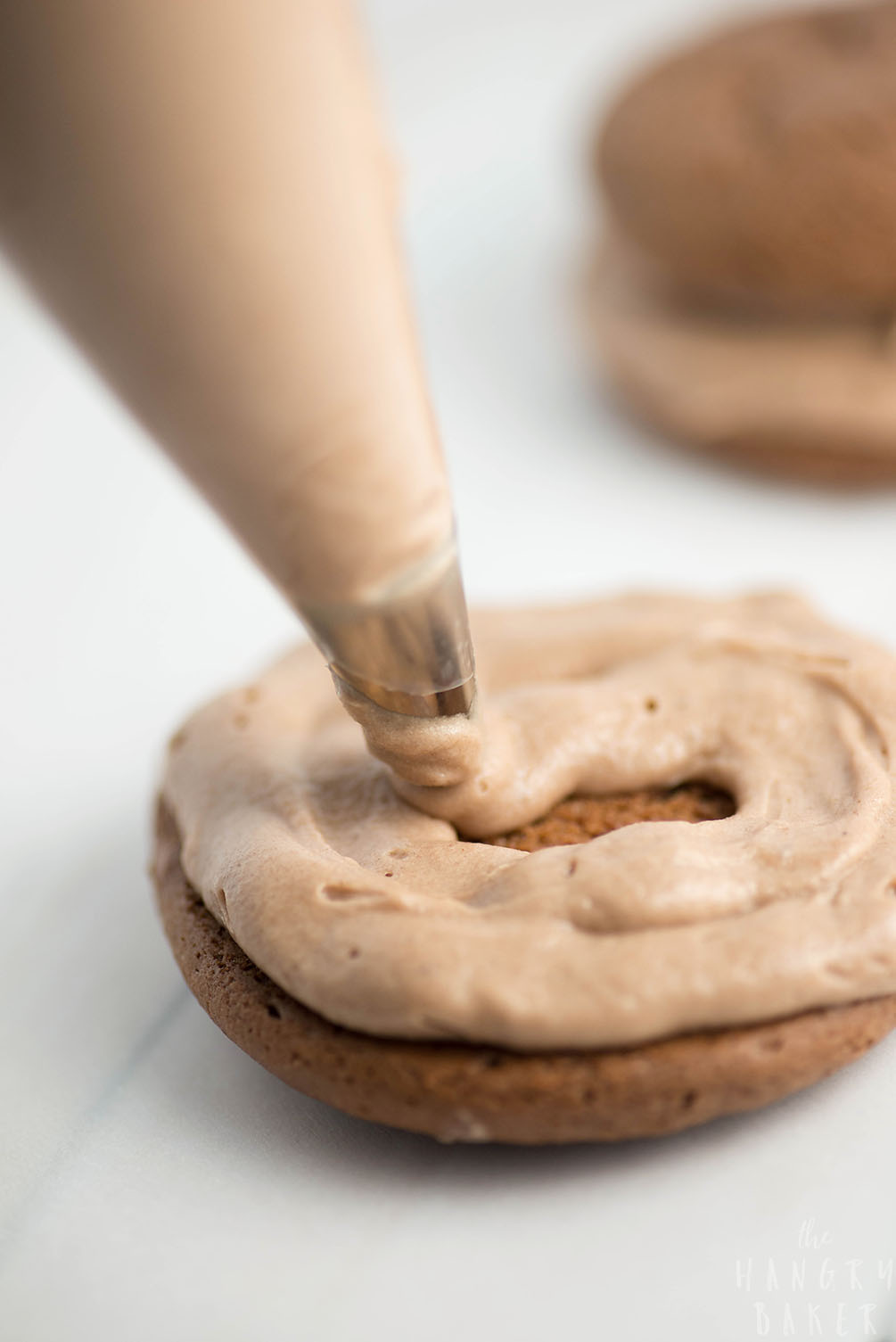 Double Chocolate Whoopie Pies - Two soft chocolate cookie cakes filled with light and fluffy chocolate cream = amazing!