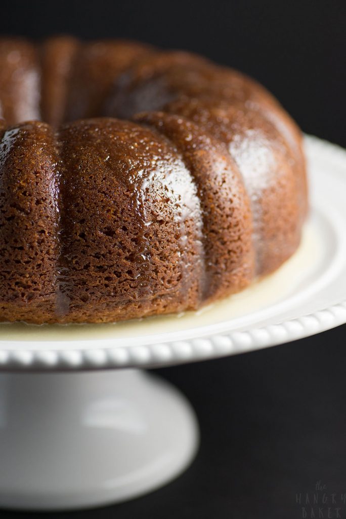 White Wine Cake - This super moist cake tastes exactly like a glazed donut! A warm buttery glaze tops this deliciously soft and addictive cake!