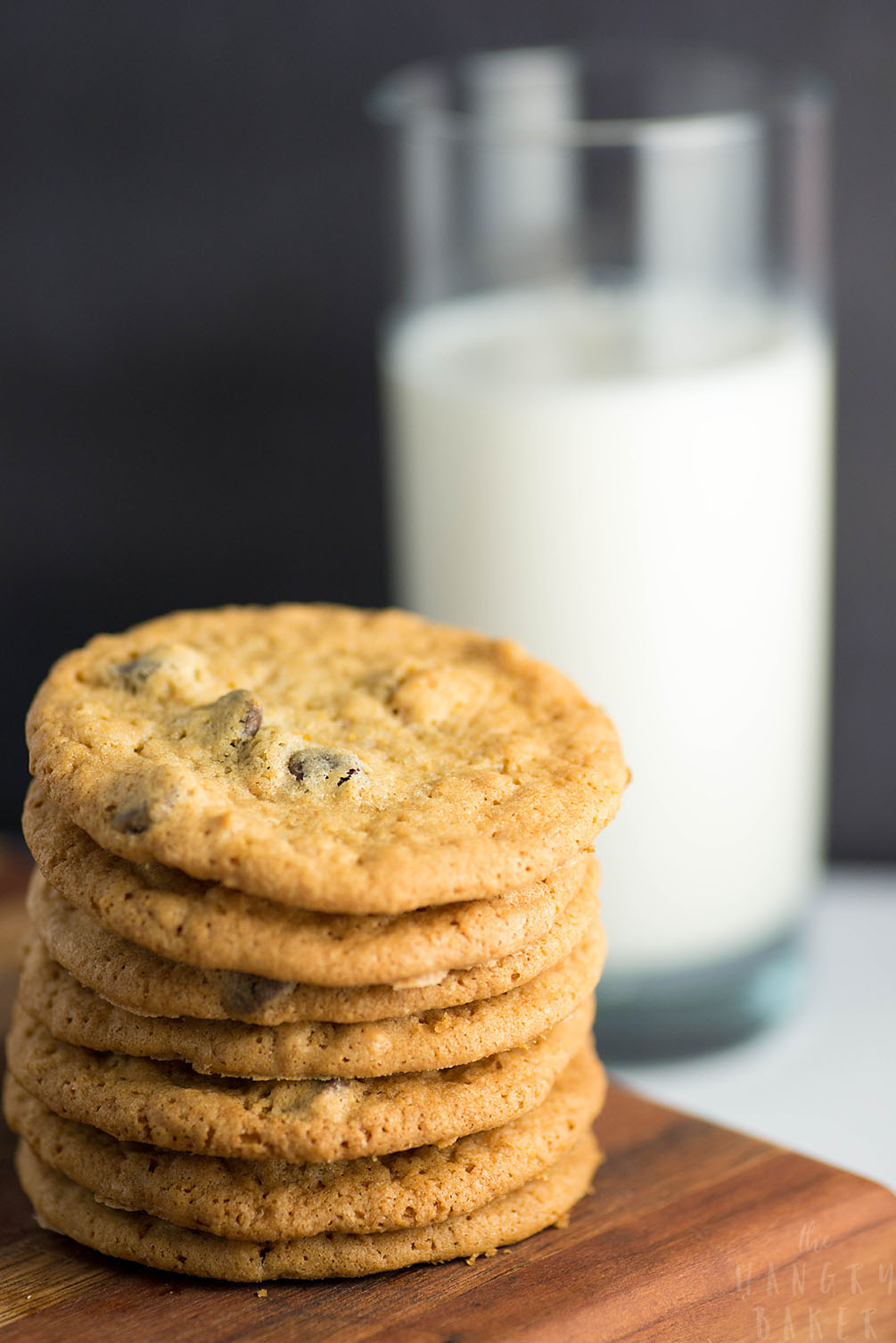 Crunchy and Chewy Chocolate Chip Cookies - the perfect balance of crunchy AND chewy! These thinner chocolate chip cookies are super addictive!