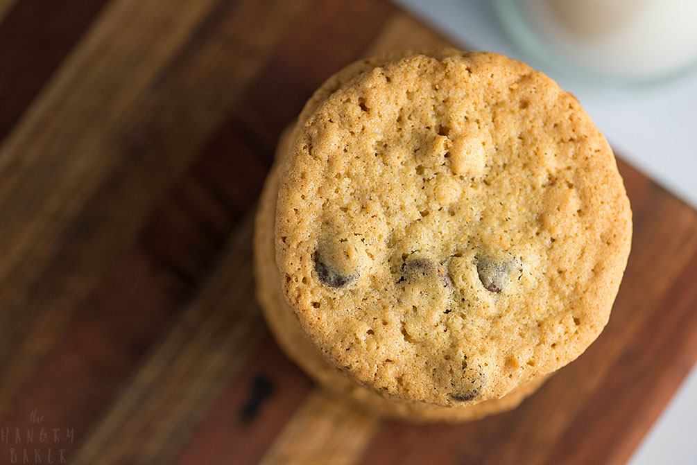 Crunchy and Chewy Chocolate Chip Cookies - the perfect balance of crunchy AND chewy! These thinner chocolate chip cookies are super addictive!