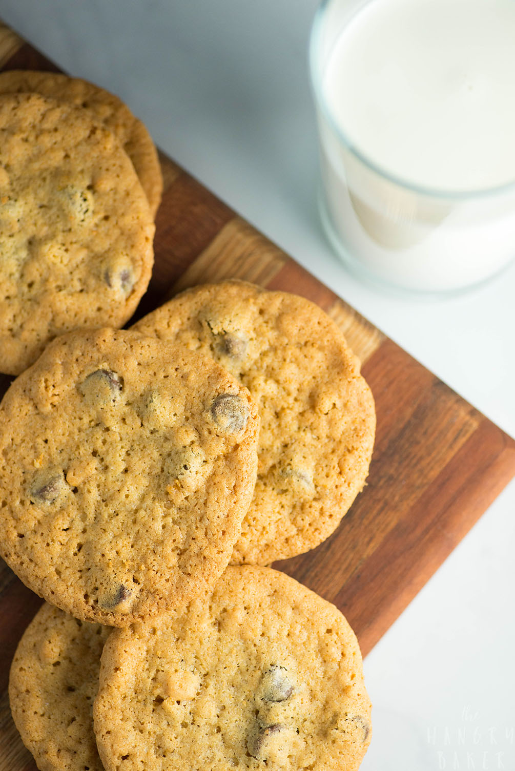 Crunchy and Chewy Chocolate Chip Cookies - the perfect balance of crunchy AND chewy! These thinner chocolate chip cookies are super addictive!