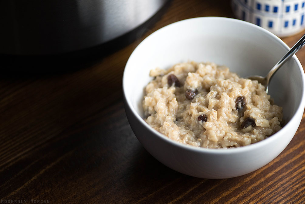 Overnight Cinnamon Raisin Oatmeal - A deliciously warm and hearty breakfast, perfect for fall and winter! With the perfect amount of cinnamon, brown sugar and raisins, this hot cereal is a great way to start your day! It's made in a rice cooker too!