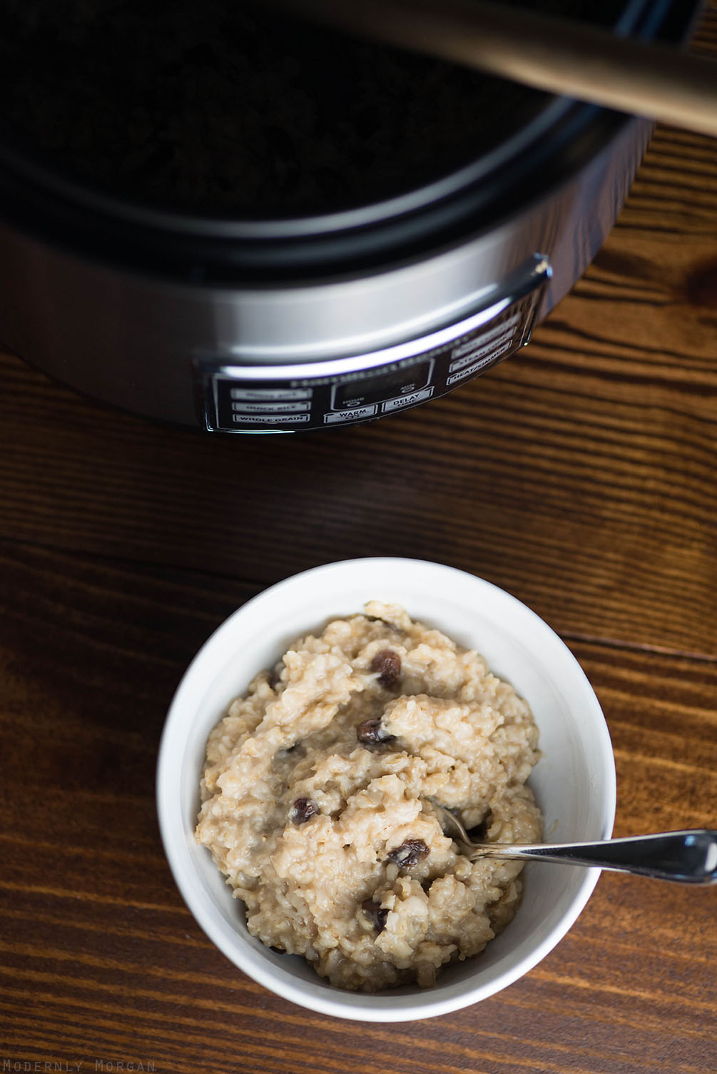 Overnight Cinnamon Raisin Oatmeal - A deliciously warm and hearty breakfast, perfect for fall and winter! With the perfect amount of cinnamon, brown sugar and raisins, this hot cereal is a great way to start your day! It's made in a rice cooker too!