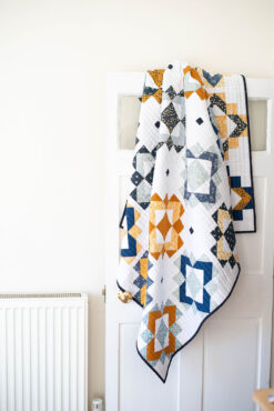 Framed Folk Quilt - a fat quarter friendly quilt pattern by Modernly Morgan