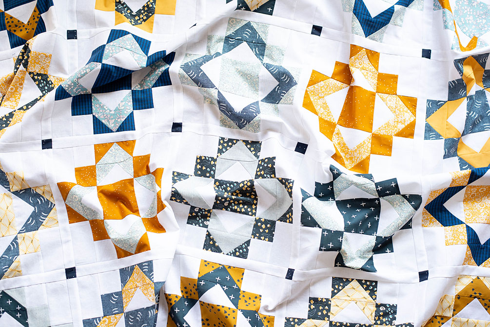 Framed Folk Quilt - a fat quarter friendly quilt pattern by Modernly Morgan