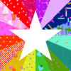 A white star sitting in front of a rainbow burst of color. This is a foundation paper pieced quilt block template.
